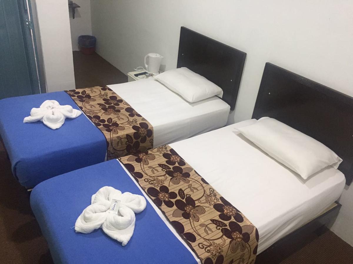מואר Hotel Singgah Inn מראה חיצוני תמונה